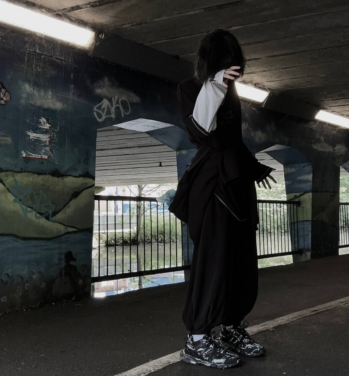 TADOW STORE clothing worn in an urban setting